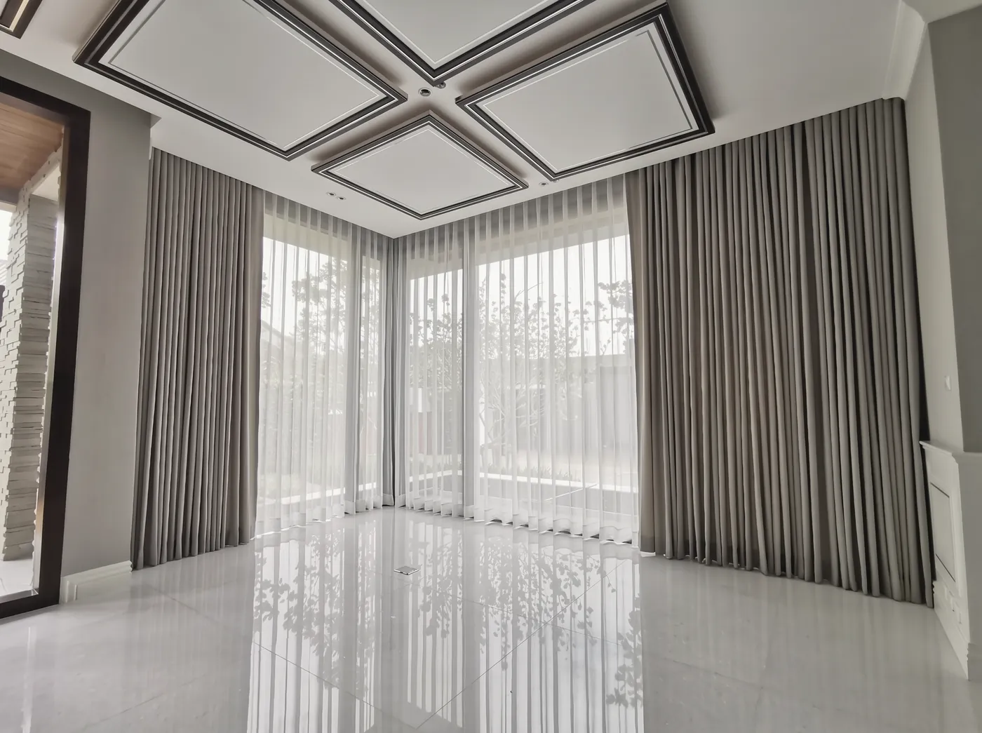 Living room, two layers across the glass wall